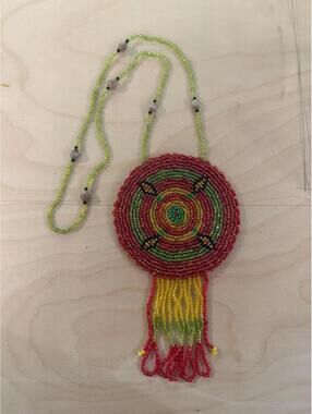 Vintage beaded Native American medallion bolo tie Navajo necklace horse tassel